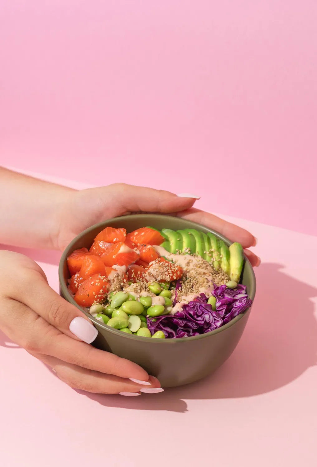 Assortment of fresh fruits, vegetables and whole foods on pink background, balanced pregnancy nutrition concept