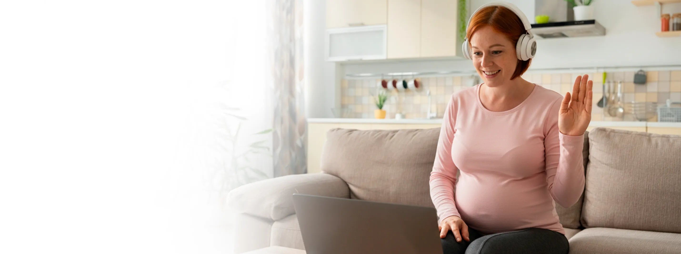 Pregnant woman working from home on laptop, modern maternity lifestyle and online wellness consultation